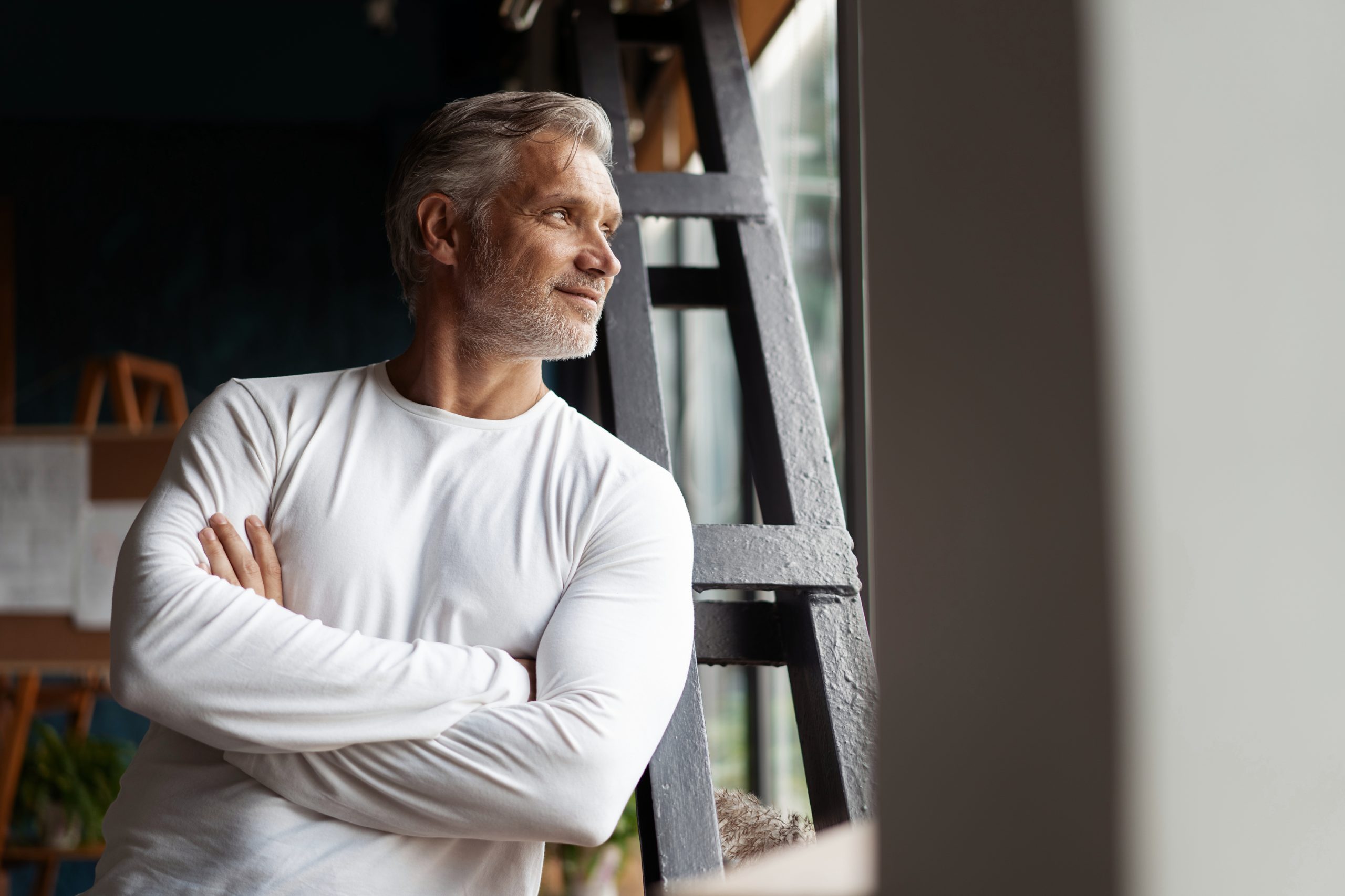 Confident man engaging in men's pelvic health physio services with welcoming approach at clinic in Mosman